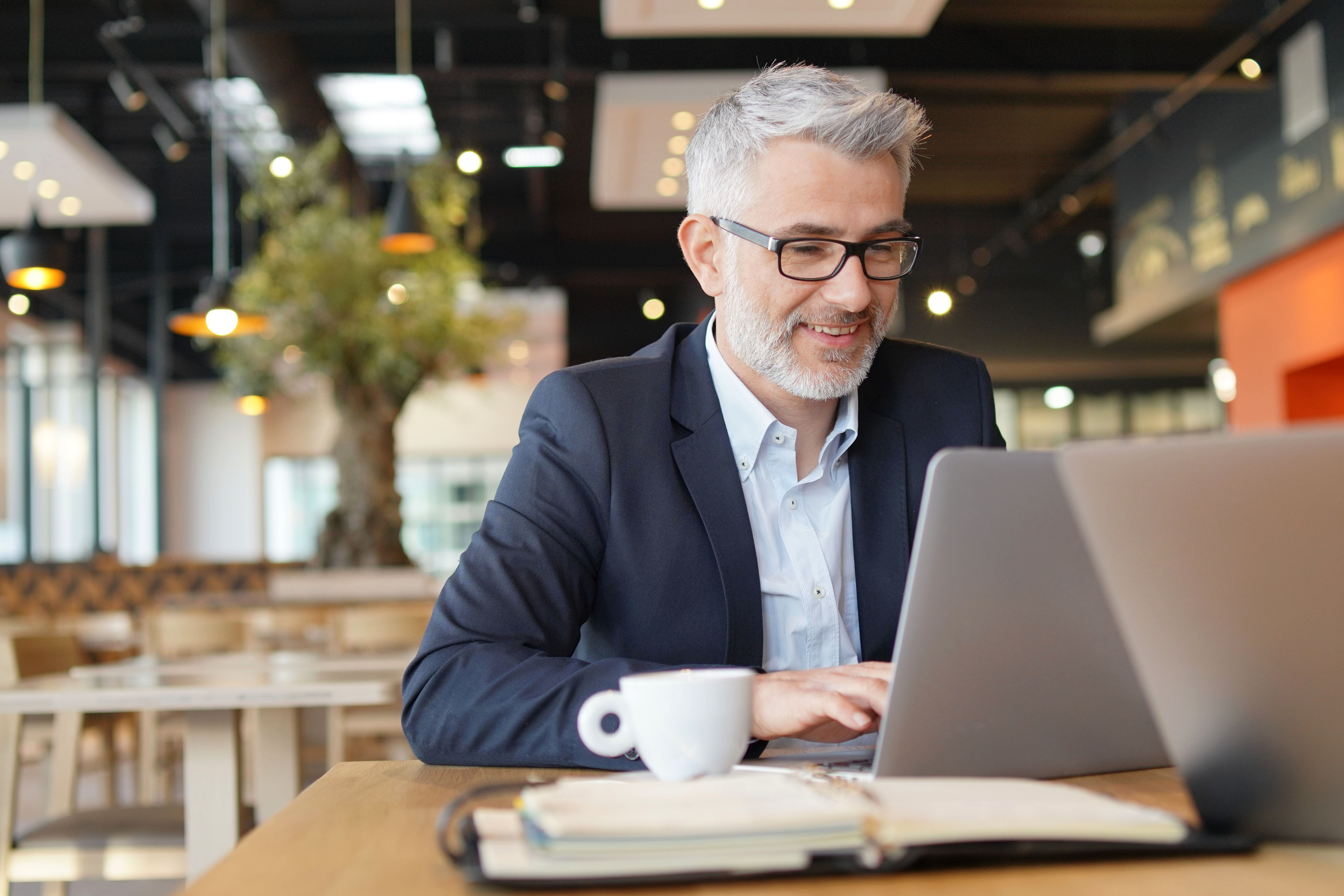 Smiling businessman in informal meeting