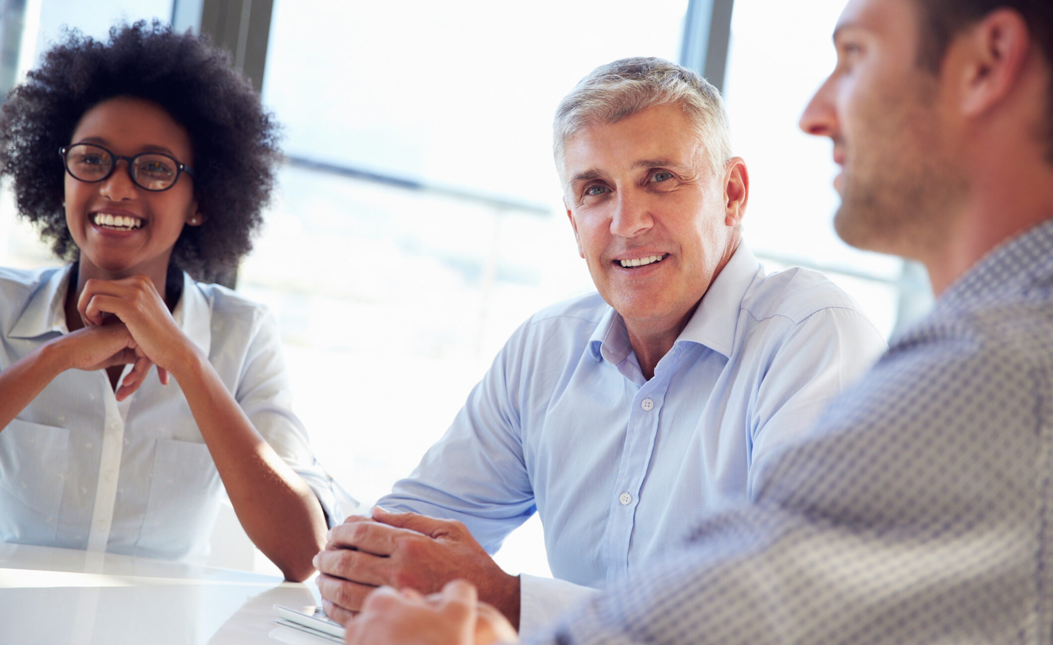 Three business professionals working together